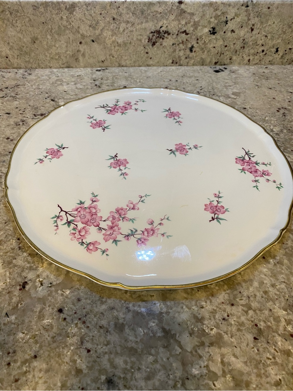 Porcelain Cake Stand with Pink Floral Motif and Gold Trim 13 & 1/2” tiny mark on